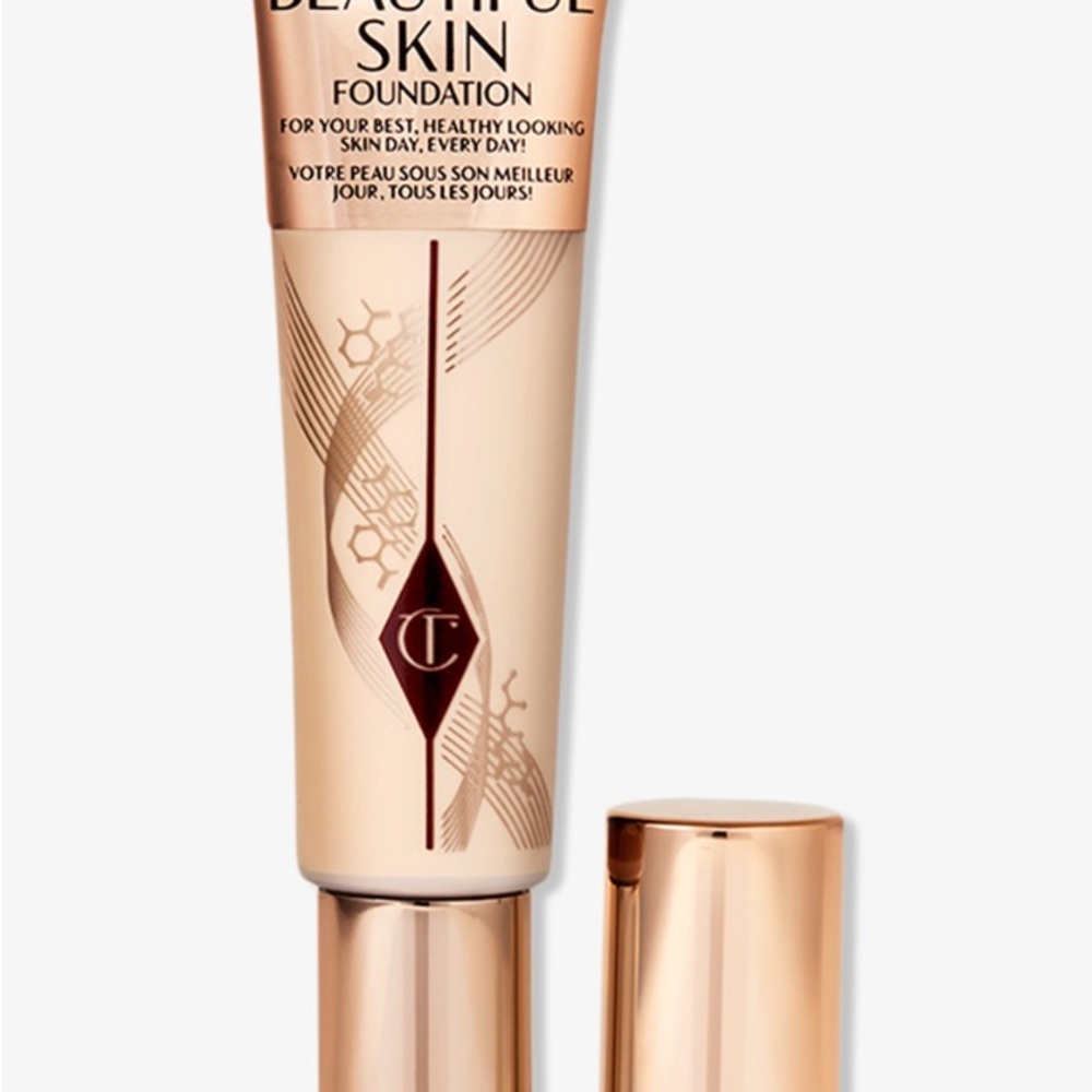 Charlotte Tilbury Radiant Skin Foundation in Gold and White Packaging
